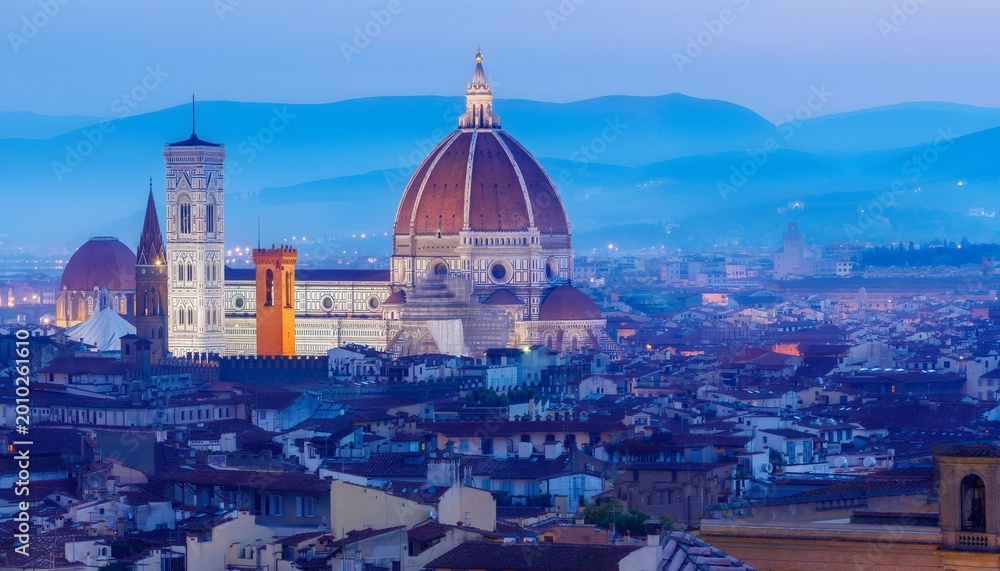 Fototapeta premium Renaissance Splendor: Breathtaking Panoramic View of the Florence Skyline Featuring the Iconic Duomo Cathedral Dome, Giotto's Campanile, and Historic Terracotta Rooftops at Golden Hour