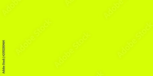 Fotografie Vibrant neon yellow solid color background with a smooth texture