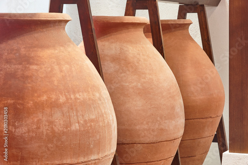 Rustic handmade clay pots to storage wine and oil. Spain