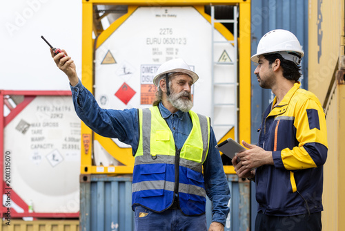 Konstfotografi Engineers workers with tablet in a refinery - oil processing equipment and machinery, Industry zone gas petrochemical