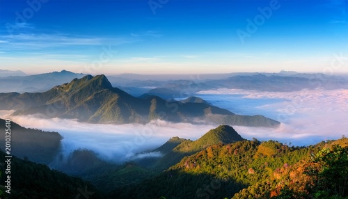mountain landscape with fog with blue sky in the morning at chiang mai thailand