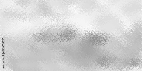 Silver background from metal foil on cardboard decorative texture