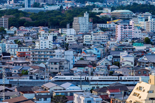 Foto Cityscape view of Beppu city and Beppu bay and Mountain backgrouns, Oita, Kyushu