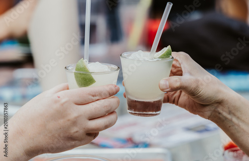 Cheers with Shot Glass Margaritas