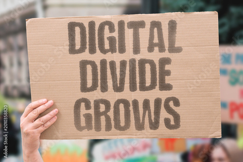 Foto "Digital Divide Grows" The gap between digitally capable and digitally excluded populations is widening as services migrate exclusively online