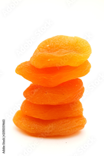 Foto Healty Snack - Dried Apricots isolated on white background