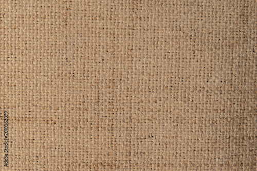 Foto natural beige burlap texture background: close up of rough woven jute or linen f