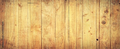 Vászonkép Vertical light brown wooden planks with natural grain patterns, knots and subtle color variations create a warm rustic textured surface filling the entire frame