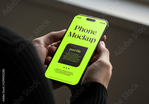 Close up of a smartphone held by two hands