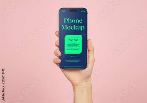 A woman holding a smartphone on pink background