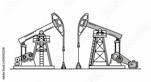 Foto Two Oil Pump Jacks Working in Tandem.