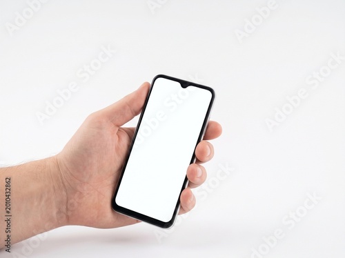 Hand holding a smartphone with a blank white screen isolated on white background