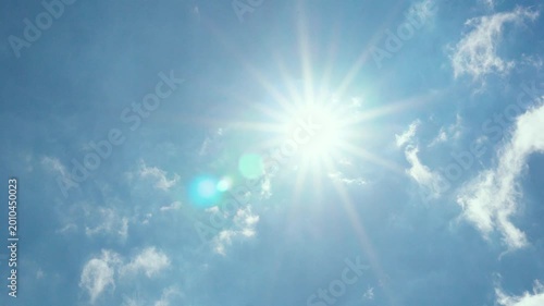 Beautiful sunny pure azure sky shining sun close-up and some white clouds, clear blue sky in sunlight sun rays sunbeams daylight sunshine, Aerial View, Air Plane Window View Time Lapse Slow Motion 4K.