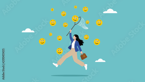 Photos Young woman chasing many smiling face emoticons with a butterfly net for success