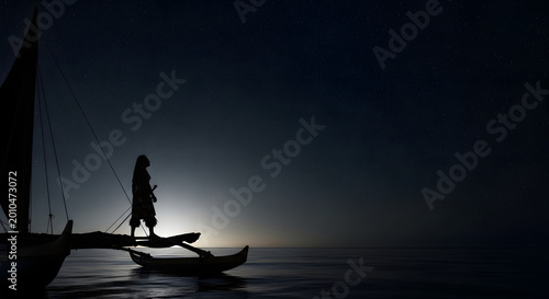 Silhouette of a traditional polynesian voyager navigating by the stars