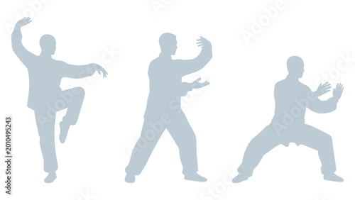 Fotografi Three silhouettes of people practicing tai chi in various poses with kung fu mar