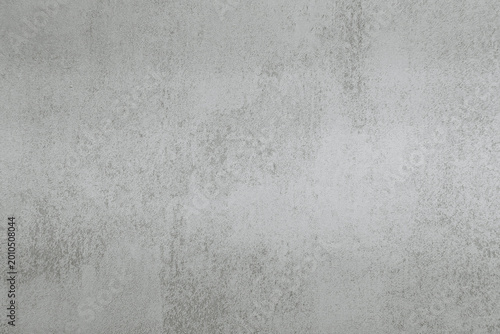 Fotografie Textured concrete surface with subtle variations in light