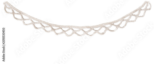 White crochet lace border with curved openwork pattern isolated on transparent background. Decorative trim element for design mockup, invitation, textile projects, or vintage style overlays.
