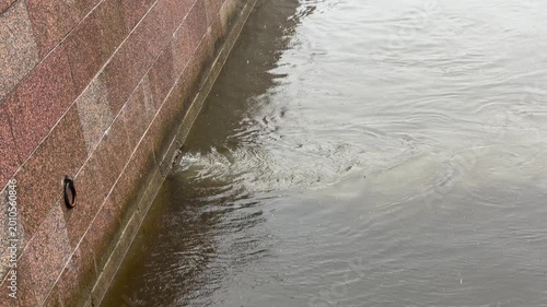 industrial environmental pollution, waste discharge into the city river. environmental pollution. industrial sewage discharged into clean water.