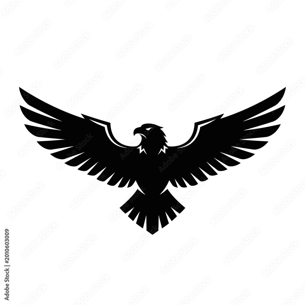 Obraz premium Black silhouette of a soaring eagle with spread wings.