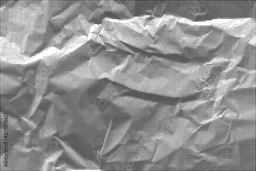 A close-up view of a crumpled paper with a highly textured surface