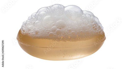 Tableau sur toile Amber liquid soap bar with abundant white foam bubbles, isolated on transparent