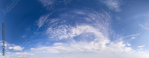 Bild auf Leinwand Wide Blue Sky Cloudscape With Wispy Cirrus and Altocumulus Clouds Over Serene Ho