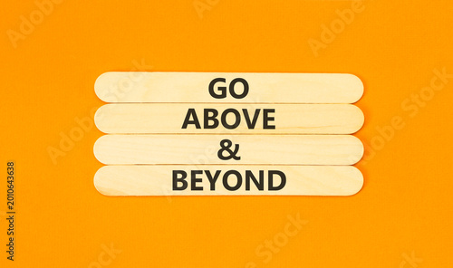 Konstfotografi Go above and beyond words symbol