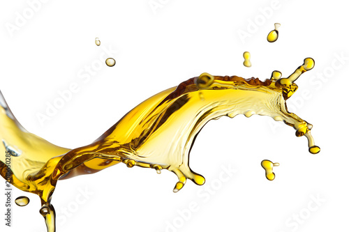 A stream of golden liquid splashing against a black background on transparent background