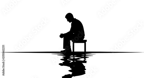 Photos Silhouette of a sad lonely man sitting on a chair with reflection