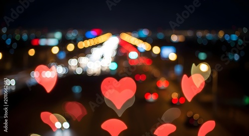 Colorful Heart Shaped Bokeh Lights in Glowing Night City Traffic