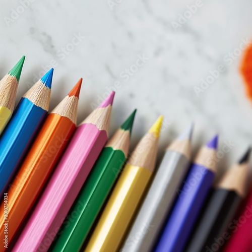 Colored Pencils Arranged on a Flat Surface for Art Projects and Creative Acti...