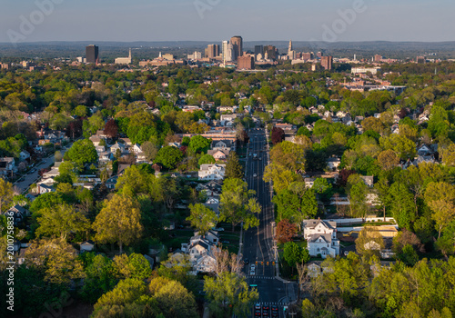 Quadro su tela Aerial view of West Hartford and Hartford, Connecticut on a mild May evening