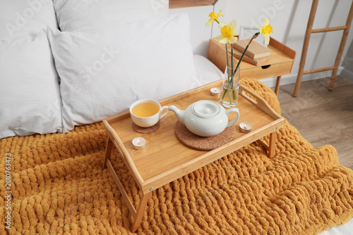 Tray with teapot, cup of te...