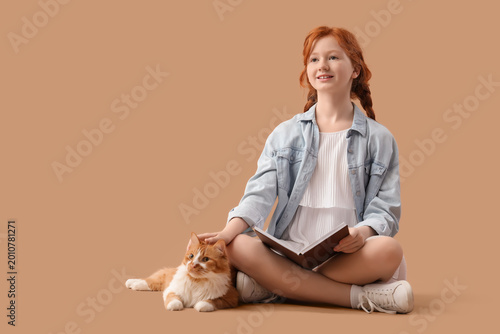 Redhead teenage girl with b...