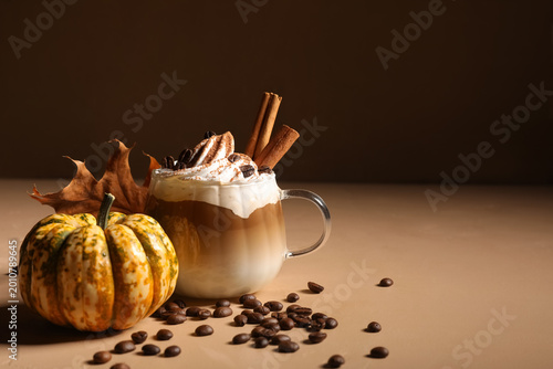 Mug of pumpkin latte with w...