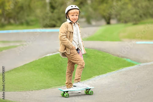 Cute little boy with helmet...