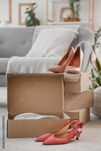 Boxes with women's shoes in...