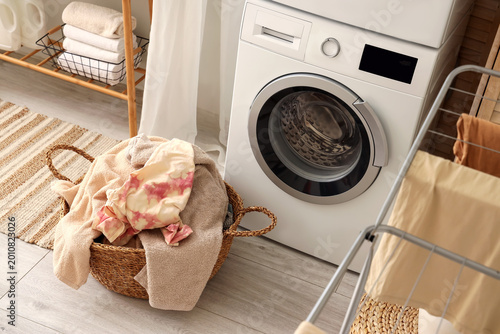 Laundry basket with dirty c...