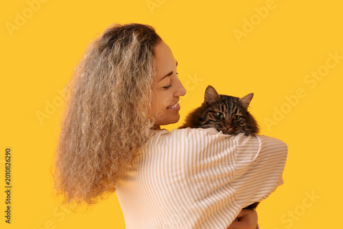 Mature woman with cute cat ...
