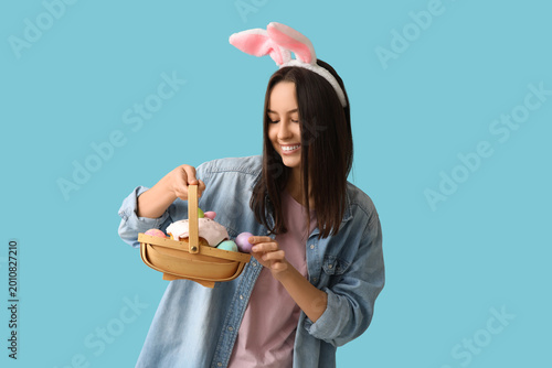 Pretty young woman with bun...
