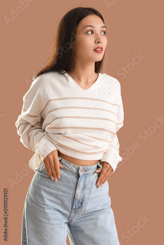 Young Asian woman in trendy...
