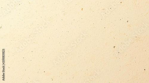 Natural beige handmade paper texture with organic fiber flecks. High resolution recycled craft material for elegant minimalist design, eco-friendly stationery, web backgrounds, or authentic print