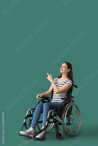 Young woman in wheelchair p...