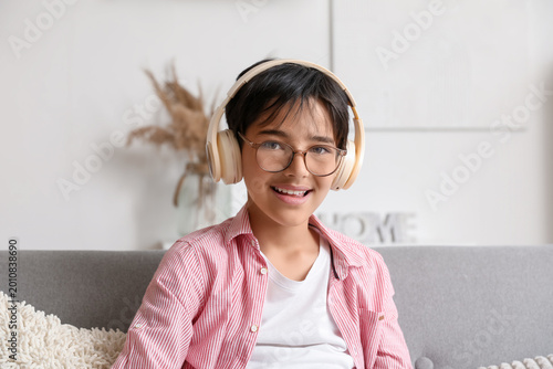 Little boy in headphones at...