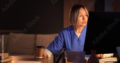 Female nurse with coffee cu...