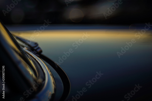 Close-up view vintage American auto details with bokeh effect.