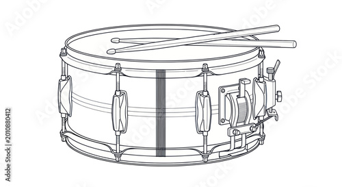 Fotografie Snare Drum with Drumsticks on Top.