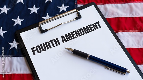 Fourth amendment document with pen on american flag background representing law rights and constitution concept
