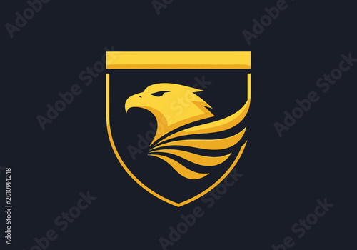 Bild auf Leinwand Minimalist gold eagle shield logo on dark background